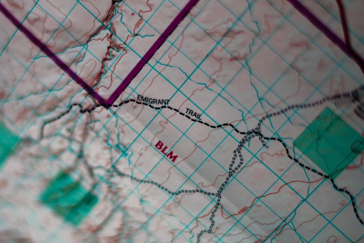 Topographic hunt unit map showing BLM boundaries, trails, and grid overlay used to read draw odds data
